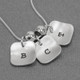 hand stamped brushed silver squares initial necklace, shown close up