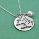 Sterling silver You Are My Sunshine necklace with birthstone, shown from the side
