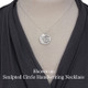 Example of fine pewter anchor charm in use, on a silver Sculpted Circle Handwriting Necklace, shown on a model