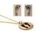 Custom footprints necklace in gold with hand stamped name Charlotte & birthstone, shown from the side with the actual footprints used to personalize it