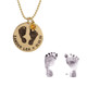 Custom footprints necklace in gold with hand stamped name Zander Lea & birthdate with birthstone, shown with the actual footprints used to personalize it