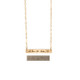 Gold bar necklace with handwritten note from sister, shown with the original handwriting used to personalize it