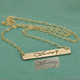 Gold bar handwriting necklace, shown with the original handwriting used to personalize it