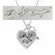 Large silver heart handwriting necklace with keys to your heart, with original artwork saying Eye Love You, shown close up on white