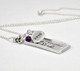 Side view of custom rectangle family necklace in silver, personalized with handwriting signatures of Mom & Dad, with silver year charms and birthstones