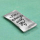 Side view of back of fine pewter pocket charm with a raised heart, showing handwritten note engraved on it