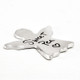 Side view of Angel pocket token in fine pewter with custom handwriting