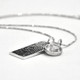 Custom Silver fingerprint necklace, personalized with your loved one's fingerprint, shown from the side with heart charm