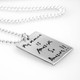 Custom silver necklace with handwritten note on rectangle tag for mom, personalized with kid's handwriting, shown from the side