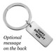 View of stamped message on the back of custom silver key ring, personalized with "Happy Birthday Mom", while front is engraved with a fingerprint