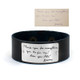 Black handwriting leather bracelet with actual handwriting used to personalize it shown on white background