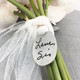 Signature on bouquet charm with cross