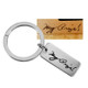 Custom memorial Silver key ring shown with actual handwriting from husband used to personalize it, on white background