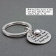 Memorial handwriting key ring in sterling silver, shown with original handwritten note used to personalize it