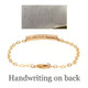 Dainty bracelet with child's actual handwriting in gold, shown with handwritten note to Mom used to personalize it