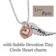 Custom Handwriting Memorial Charm Silver Angel Wing Necklace, shown with handwritten note used to personalize it
