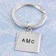 Monogram initials on a personalized silver Square Life Key Ring
