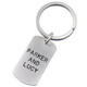 Custom silver military tag key chain for Dad personalized with kids' names stamped on the front: Parker & Lucy