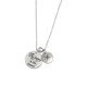 Custom sterling silver necklace with "The Journey is the Reward" stamped in script, with another charm showing compass points, shown on white
