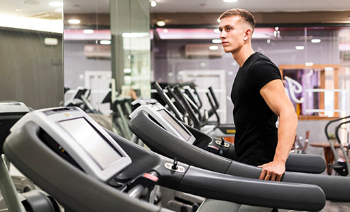 A gym with a treadmill that says o'neill on it - image