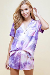Satin tie dye collared drop shoulder short sleeve pajama set with contrast piping detail on top only. Comes with matching shorts with elastic waistband.