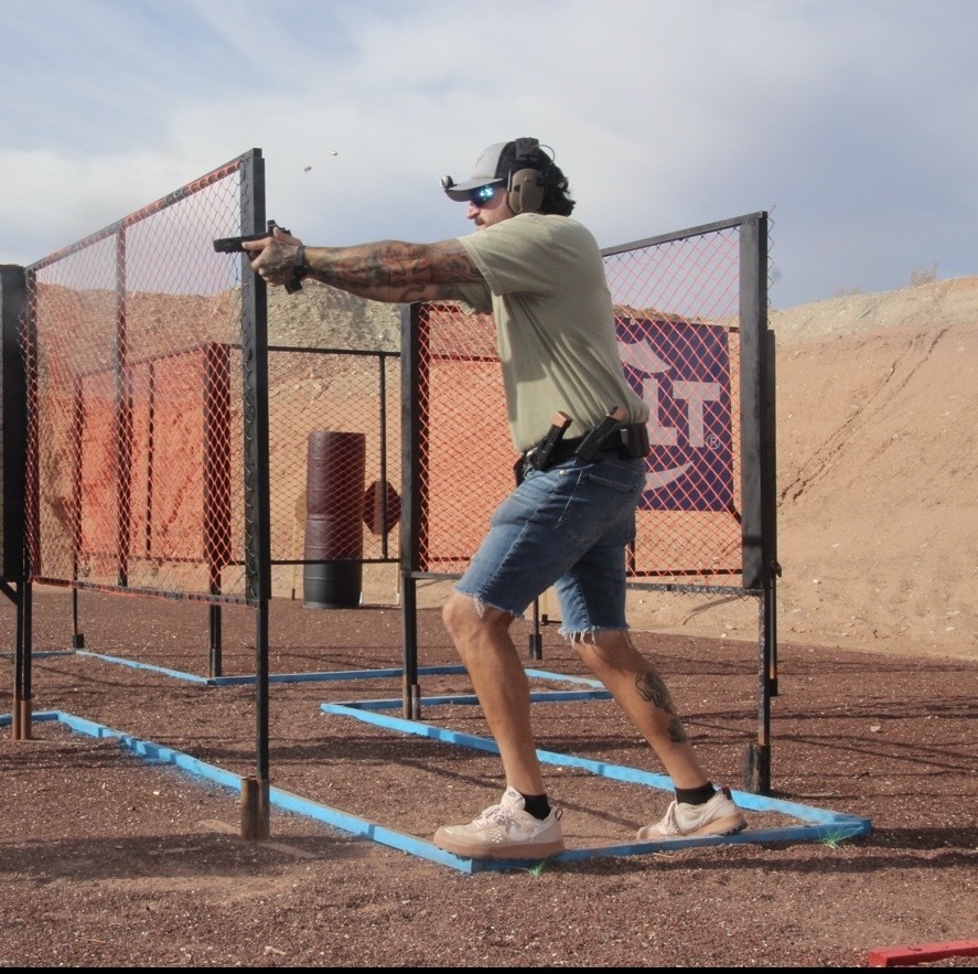 Chris shooting at a USPSA match