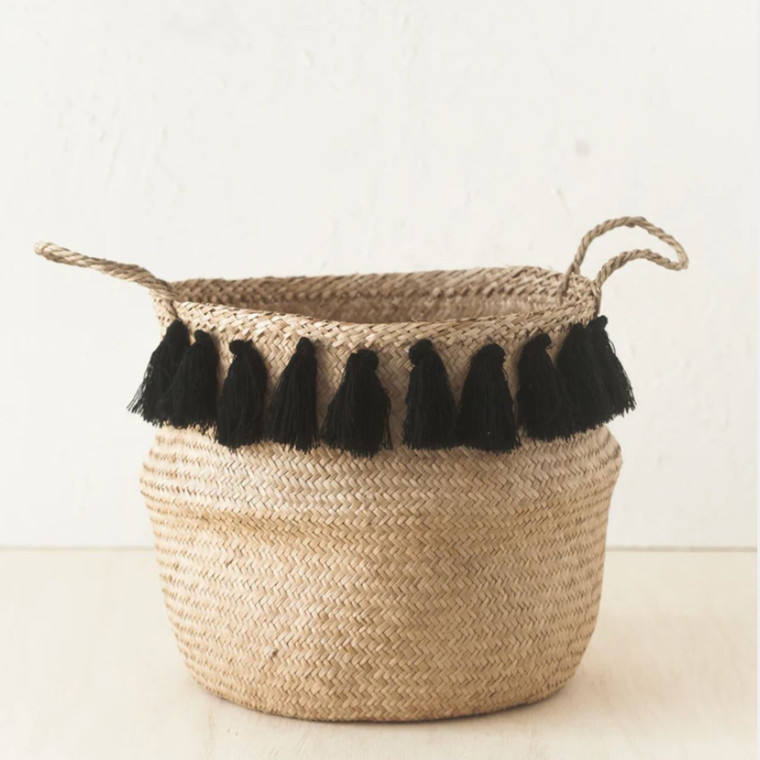 nursery storage basket with black tassels and handles