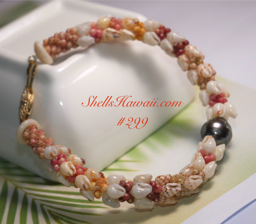 7½" Four-Strand Niʻihau Shell Bracelet – Momi & Kahelelani with Tahitian Pearl Centerpiece #299 7½" Four-Strand Niʻihau Shell Bracelet – Momi & Kahelelani with Tahitian Pearl Centerpiece #299