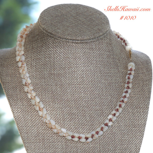 19 1/4" white Momi with light blue hue, brown spotted Momi, burgundy Kahelelani shells design into heliconai style  shell necklace #1010