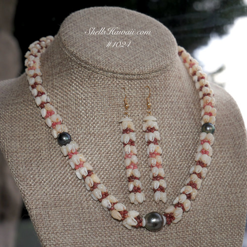 Option 1 (Niʻihau shell lei):
18½" Niʻihau shell lei and earrings – four-strand Kipona style with creamy Momi shells, rich Kahelelani in pink & burgundy, and a luminous Tahitian pearl centerpiece Option 1 (Niʻihau shell lei):
18½" Niʻihau shell lei and earrings – four-strand Kipona style with creamy Momi shells, rich Kahelelani in pink & burgundy, and a luminous Tahitian pearl centerpiece