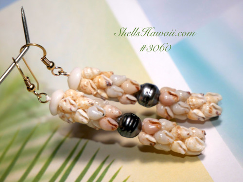 2¼″ Poepoe style Niʻihau shell earrings featuring warm yellow Lenalena, deep blue ʻUliʻuli, and rare purple Momi shells, with an 8.35 mm silver-hued Tahitian pearl at the center. Vibrant, elegant, island art. 2¼″ Poepoe style Niʻihau shell earrings featuring warm yellow Lenalena, deep blue ʻUliʻuli, and rare purple Momi shells, with an 8.35 mm silver-hued Tahitian pearl at the center. Vibrant, elegant, island art.