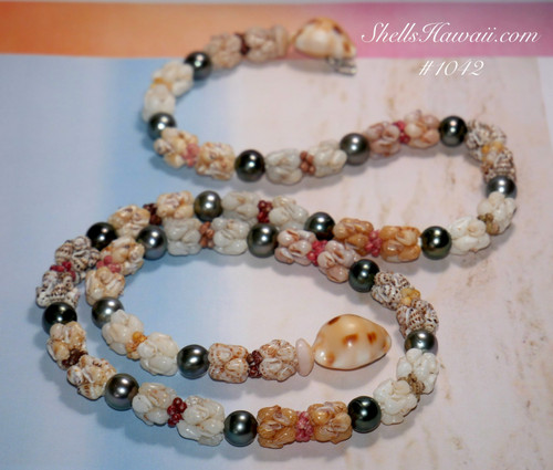 20″ Niʻihau shell lei with matching earrings featuring a stunning Moonrise pendant and radiant Momi and Kahelelani shells