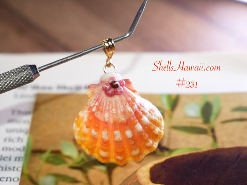 Pink, orange, and golden yellow Hawaiian sunrise shell pendant with authentic Niʻihau shells and Kahelelani flower accent