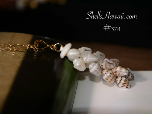 Authentic Niʻihau shell pendant — 18″ Pikake-style necklace made with rare multicolor Momi shells from Niʻihau, showcasing unique spotted and blue hues