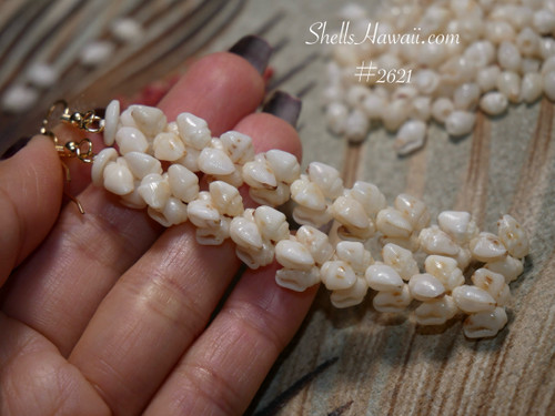 3″ Pikake style earrings handcrafted with soft off-white Tuaʻula Niʻihau Momi shells, classic floral cluster silhouette with natural sheen.