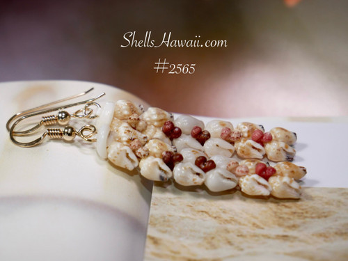 Heliconia-style Niʻihau shell earrings featuring a blend of Momi and Kahelelani shells in soft natural tones, handcrafted with 14K gold-filled findings. A floral-inspired design that reflects the elegance and spirit of Hawaiian craftsmanship. Heliconia-style Niʻihau shell earrings featuring a blend of Momi and Kahelelani shells in soft natural tones, handcrafted with 14K gold-filled findings. A floral-inspired design that reflects the elegance and spirit of Hawaiian craftsmanship.