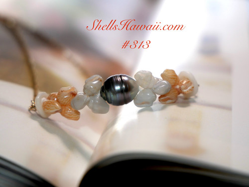 Authentic Niʻihau blue ʻŪliʻuli and golden Kahakaha ʻĀhiehie Momi shell pendant necklace 16½″ with Tahitian pearl