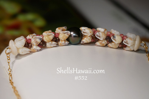 Authentic Hawaiian shell pendant featuring Momi shells and Kahelelani shell accents with dark Tahitian pearl on gold filled chain