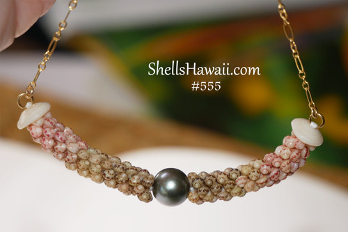 Authentic Hawaiian shell pendant featuring ombre green Kahelelani shells transitioning from deep green to off white with pearl