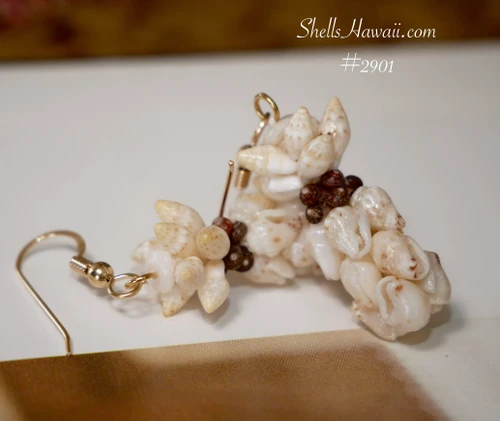 nier_2901
Hawaiian pineapple style shell earrings handmade with Niihau shells off white Momi light blue undertone yellow toned Laiki and brown Kahelelani