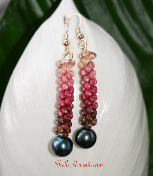 Donna Custom earrings 
Custom order for Donna Niʻihau Kahelelani shell earrings in Poepoe style with Tahitian pearls, featuring dark brown burgundy red hot pink pink flower soft pink and keʻokeʻo colors, shown on white leaf with green background to highlight color contrast and fine workmanship, finished with 14k gold filled earring wires