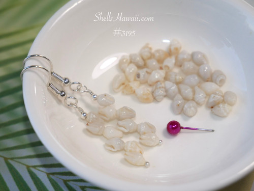 Hawaiian shell earrings in minimalist style featuring tiny Momi shells with soft off white tones, lightweight Hawaiian jewelry for everyday wear, small meaningful gift under $100 finished with sterling silver wire