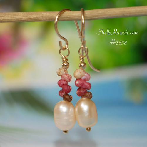 nier_3638
Dainty Hawaiian shell earrings featuring colorful Kahelelani shells with freshwater pearls in a simple minimalist drop style. The ombre blend of pink flower, red burgundy, brown, and light green tones creates a soft tropical island look perfect for birthdays, graduation gifts, everyday Hawaiian jewelry, or affordable Hawaii gifts for her.