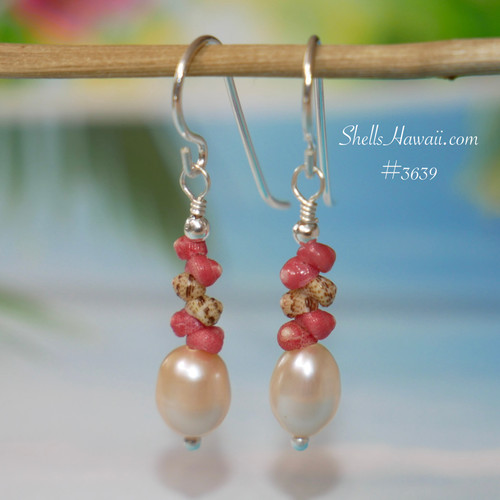 nier_3639
Handmade Hawaiian shell earrings featuring rare red Kahelelani shells with deep green accents and freshwater pearls in a minimalist drop style. Dainty Niʻihau shell jewelry perfect for birthdays, graduation gifts, tropical everyday wear, or affordable Hawaii gifts for her.
