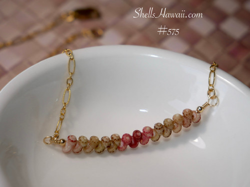Minimalist Kahelelani shell necklace displayed in a white dish featuring genuine Niihau shells in soft natural ombre tones with lightweight modern island style jewelry design. Hawaiian shell necklace gift under $200, Niihau shell necklace gift under $200, ニイハウ ミニマリスト ネックレス.