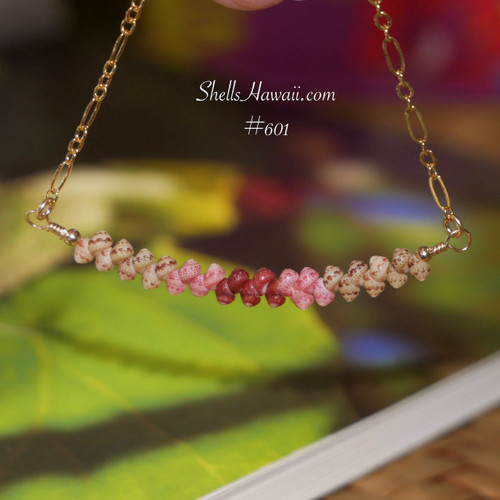 Minimalist Hawaiian shell necklace hanging naturally to showcase the lightweight floating shell design and genuine handcrafted island jewelry from Niʻihau.