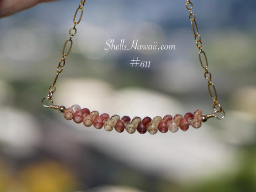 pd_611
Authentic Niʻihau shell necklace with delicate floating shell arrangement handcrafted in a lightweight coastal Hawaiian jewelry style using natural Kahelelani shells.