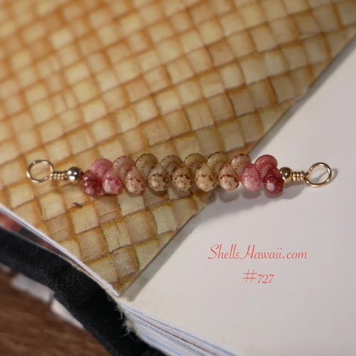 pd_727
Full view of a handcrafted 1" Niʻihau Kahelelani shell necklace section on 14K gold filled wire featuring red burgundy, pink flower, and white shells in a modern minimalist floating necklace design.