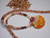 18 1/4 " orange, white, pink Sunrise shell centerpiece with white, burgundy, pink, green, yellow Kahelelani shells necklace #1063