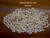 Option 2 (Lenalena Momi shells):
200 Lenalena yellow Momi shells from Niihau, mixed sizes, un-poked, highly lustrous—ideal for crafting shell jewelry